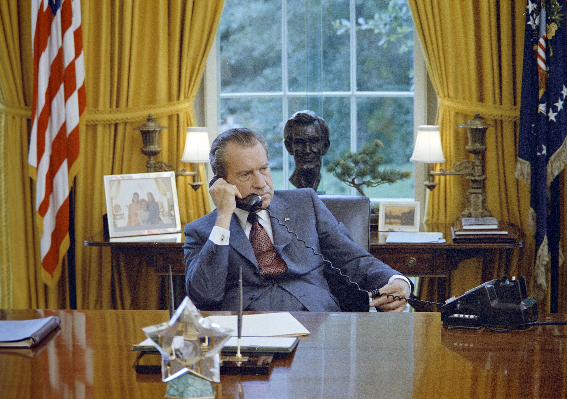 President Nixon on the telephone at his Oval Office desk